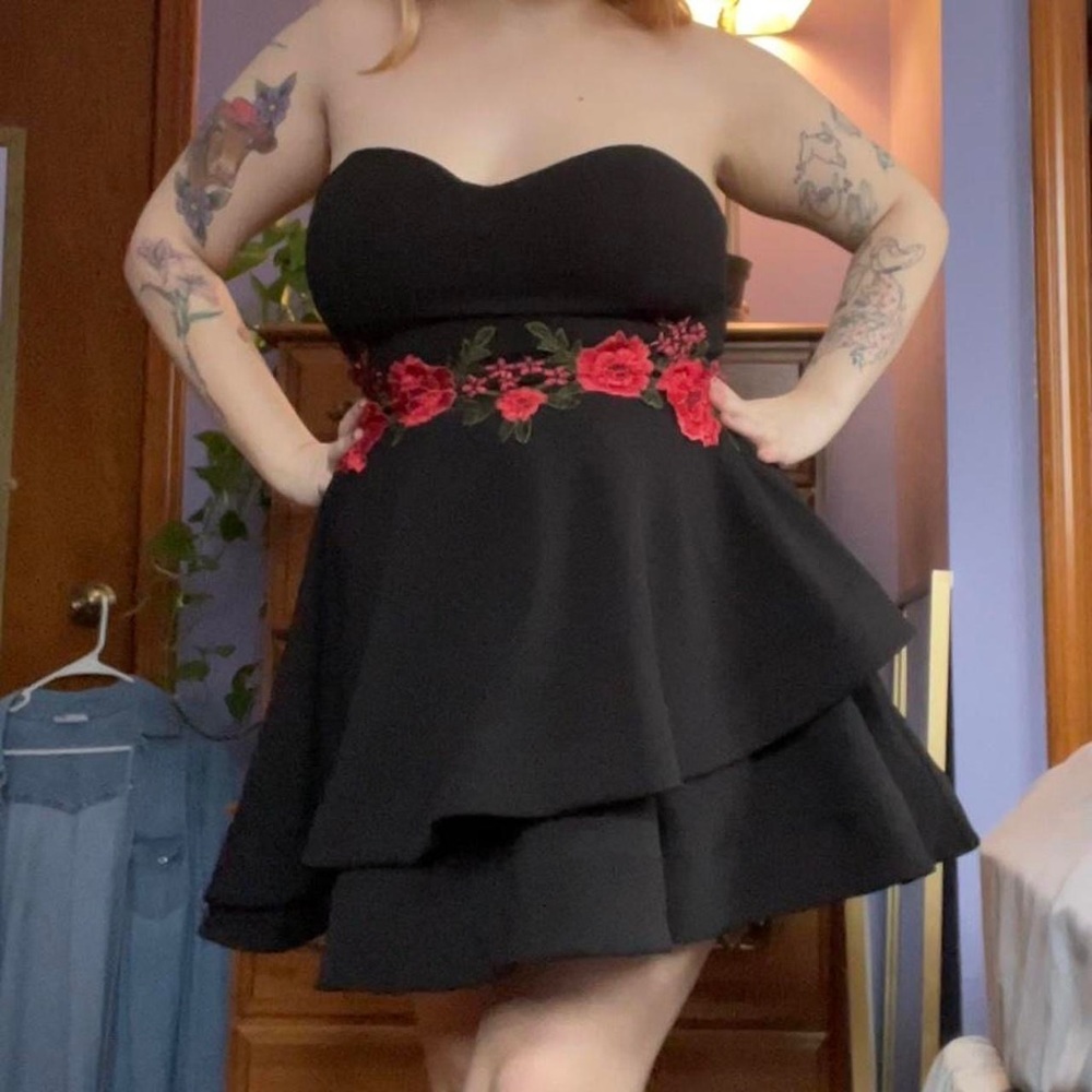 Strapless black mini dress with red flower detail. barely worn, size 14